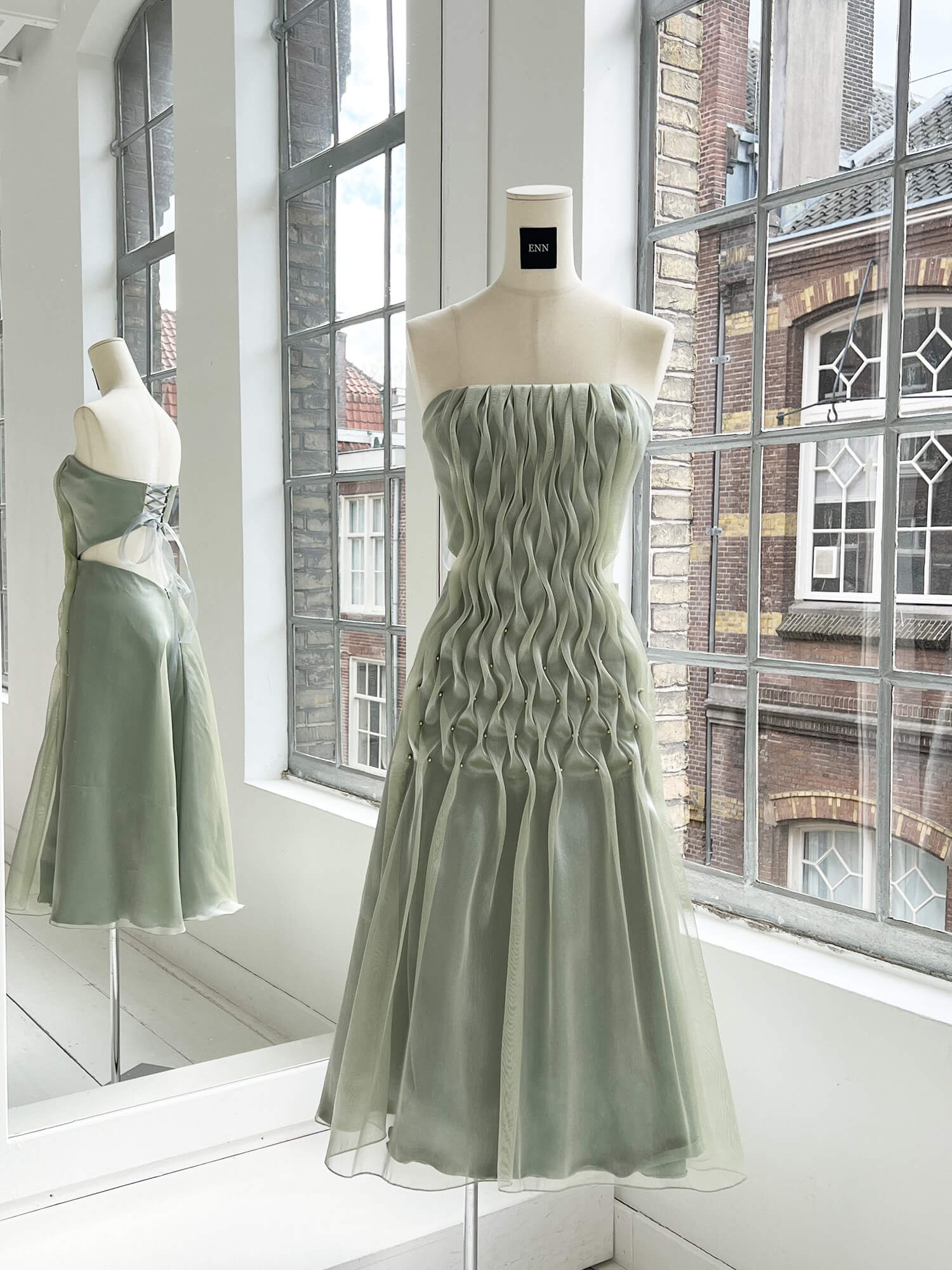 Nandin Erdene Aqua green dress Aqua dress on mannequin